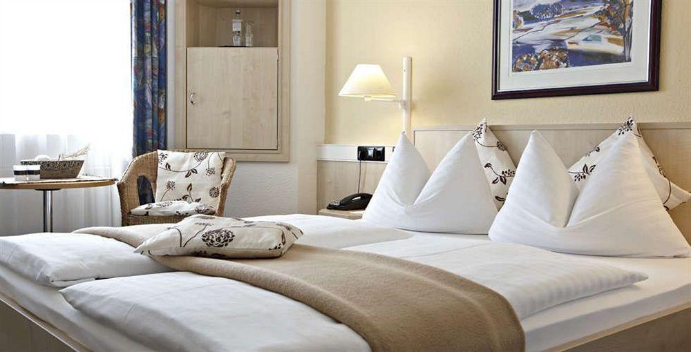 Intercityhotel Rostock Quarto foto